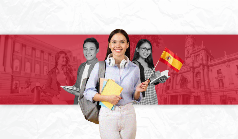 Three smiling Filipino students holding books and a small Spanish flag in front of historic Spanish architecture